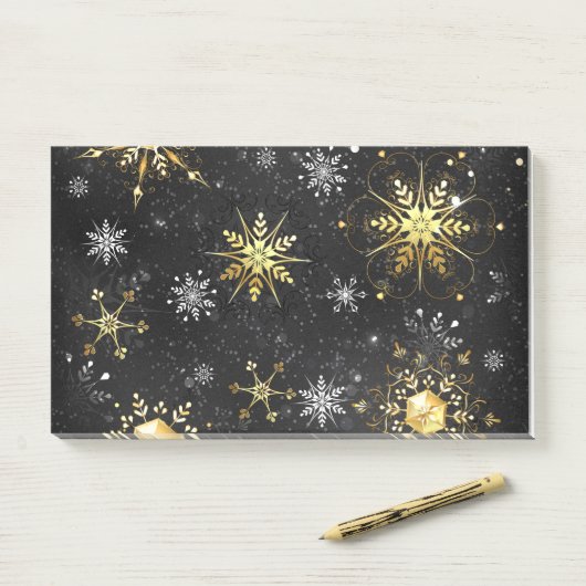 Goldene Schneeflocken auf schwarzem Hintergrund Post-it Klebezettel (Auf Schreibtisch)