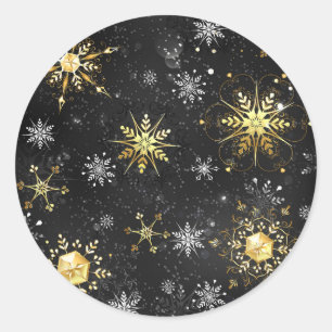 Goldene Schneeflocken auf schwarzem Hintergrund Runder Aufkleber