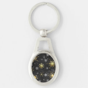 Goldene Schneeflocken auf schwarzem Hintergrund Schlüsselanhänger