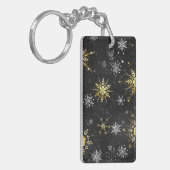 Goldene Schneeflocken auf schwarzem Hintergrund Schlüsselanhänger (Vorderseite links)