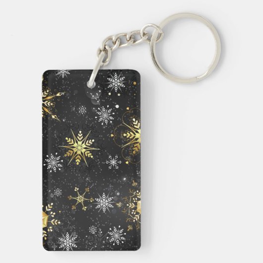 Goldene Schneeflocken auf schwarzem Hintergrund Schlüsselanhänger (Rückseite)