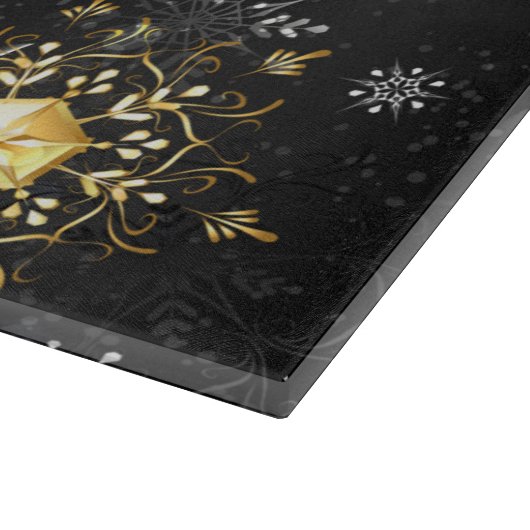 Goldene Schneeflocken auf schwarzem Hintergrund Schneidebrett (Ecke)