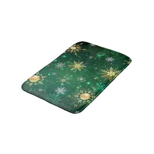Goldene Schneeflocken im grünen Hintergrund Badematte (Schrägansicht)