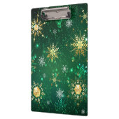Goldene Schneeflocken im grünen Hintergrund Klemmbrett (Links)