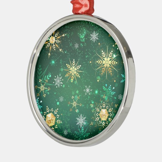 Goldene Schneeflocken im grünen Hintergrund Ornament Aus Metall (Links)