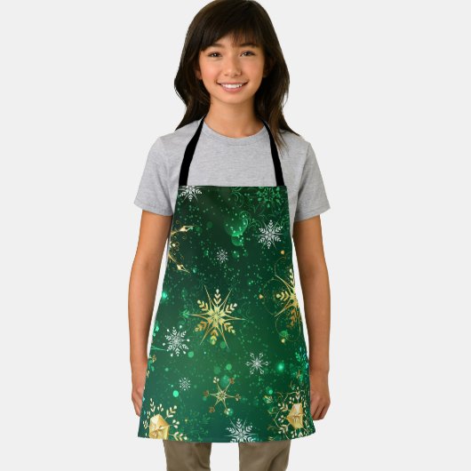 Goldene Schneeflocken im grünen Hintergrund Schürze (Insitu)