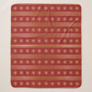 Goldene Schneeflocken im Weihnachtsmuster Sherpadecke