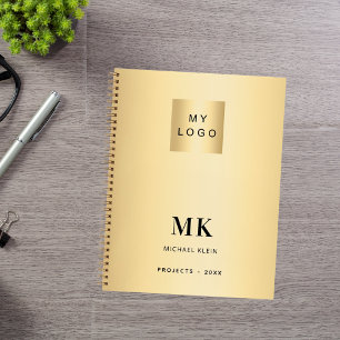 Goldene schwarze Monogramm-Anfangsbuchstaben Gesch Notizblock