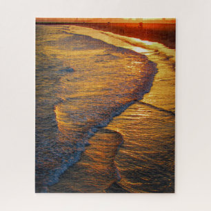 Goldene Sonnenuntergangswellen am Strand Küstenfot Puzzle