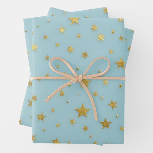 Goldene Stars und Perlen über hellblauem Hintergru Geschenkpapier Set (Beispiel)