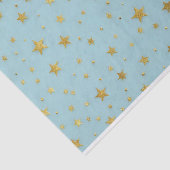 Goldene Stars und Perlen über hellblauem Hintergru Seidenpapier (Ausschnitt)