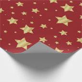 Goldene Sterne auf rotem Hintergrund Geschenkpapier (Ecke)