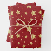 Goldene Sterne auf rotem Hintergrund Geschenkpapier Set (Beispiel)