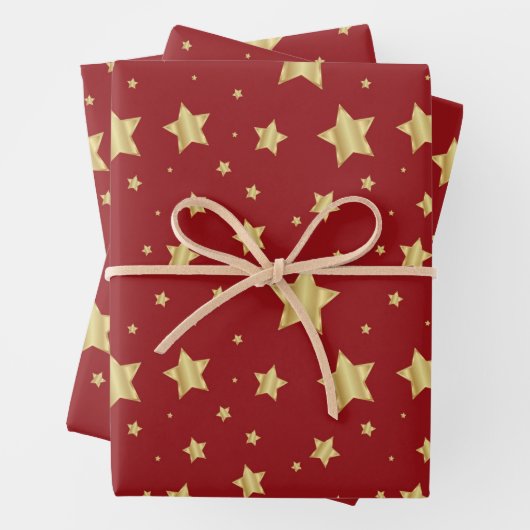 Goldene Sterne auf rotem Hintergrund Geschenkpapier Set (Beispiel)