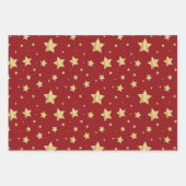 Goldene Sterne auf rotem Hintergrund Geschenkpapier Set (Vorderseite)