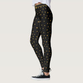 Goldene Sterne auf schwarz Leggings (Links)