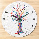 Goldene Sterne Regenbogenfarben Baum des Lebens Große Wanduhr<br><div class="desc">Diese skurrile Uhr ist mit einem Ausdruck eines Baumes des Lebens in Regenbogenfarben und goldenen Sternen dekoriert. Der Baum wurde ursprünglich aus Mosaik mit winzigen Fragmenten aus Glas in lebhaften Farben hergestellt. Original Mosaik © Michele Davies.</div>