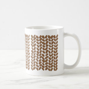 Goldene strickende Tasse