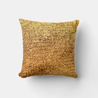 Goldene Textilien: glamouröser Makro-Hintergrund. Kissen
