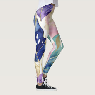 Goldene tropische Blätter in lebendiger Harmonie Leggings