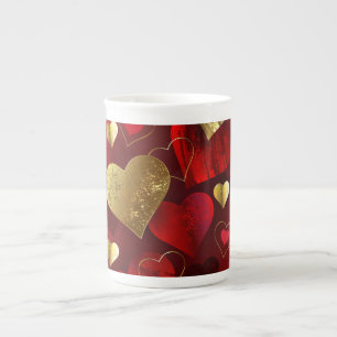 Goldene und rote Valentine Porzellantasse