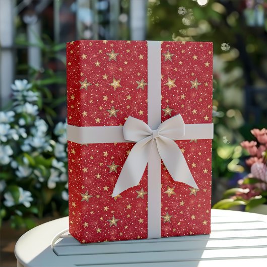 Goldene und rote Weihnachtsstern-Muster Geschenkpapier