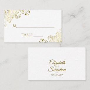 Goldene Verzierungen auf weißer eleganter Hochzeit Platzkarte