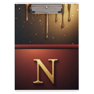 Goldener Buchstabe N Monogramm mit tropfender Meta Klemmbrett