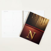 Goldener Buchstabe N Monogramm mit tropfender Meta Planer (Anzeige)