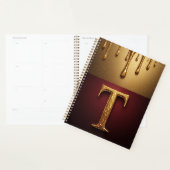 Goldener Buchstabe T Monogramm mit tropfender Meta Planer (Anzeige)