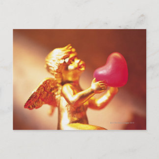 Goldener Engel mit rosa Herz, seitlicher Sicht, we Postkarte