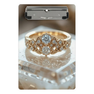 goldener glänzender Diamantring Mini Klemmbrett