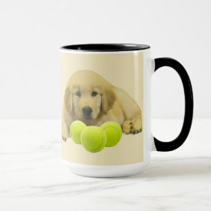 Goldener Retriever got, um Ball-Tasse zu haben Tasse