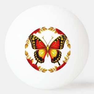 Goldener Schmetterling mit roten Rosen und goldene Tischtennisball
