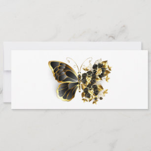 Goldener Schmetterling mit schwarzem Orchid