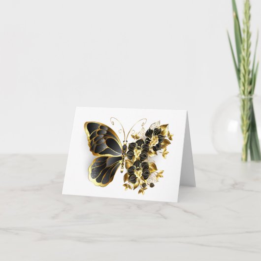 Goldener Schmetterling mit schwarzem Orchid (Vorderseite)