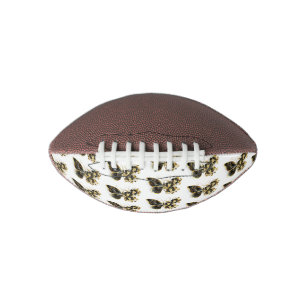 Goldener Schmetterling mit schwarzem Orchid Football