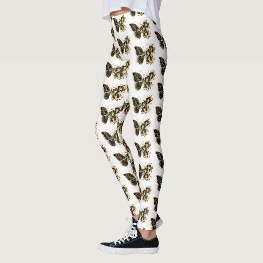 Goldener Schmetterling mit schwarzem Orchid Leggings (Links)