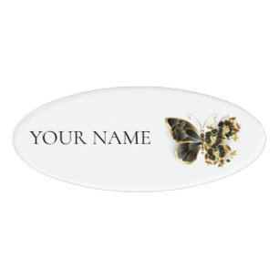 Goldener Schmetterling mit schwarzem Orchid Namenschild