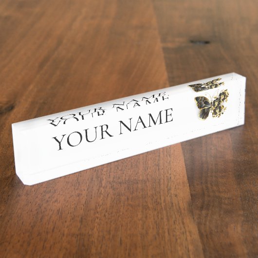 Goldener Schmetterling mit schwarzem Orchid Namensplakette (Seite)