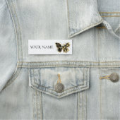 Goldener Schmetterling mit schwarzem Orchid Namensschild (Beispiel)