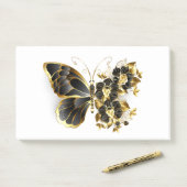 Goldener Schmetterling mit schwarzem Orchid Post-it Klebezettel (Auf Schreibtisch)