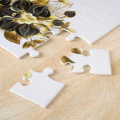 Goldener Schmetterling mit schwarzem Orchid Puzzle (Seite)