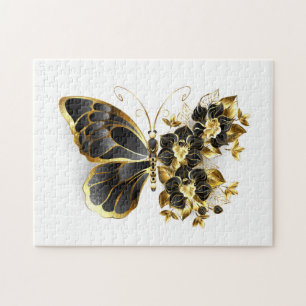 Goldener Schmetterling mit schwarzem Orchid Puzzle