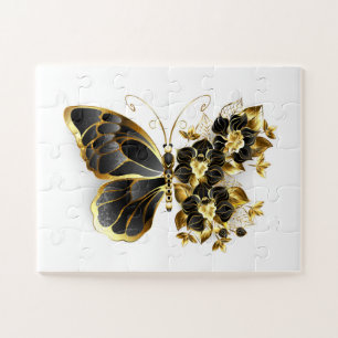 Goldener Schmetterling mit schwarzem Orchid Puzzle