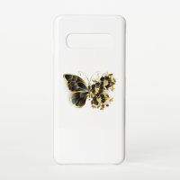 Goldener Schmetterling mit schwarzem Orchid