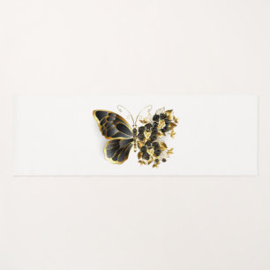 Goldener Schmetterling mit schwarzem Orchid Yogamatte