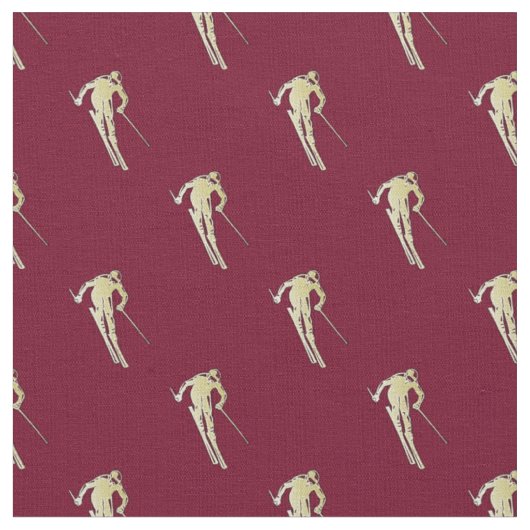 Goldener Skifahrer auf Rot Stoff (Nahaufnahme)