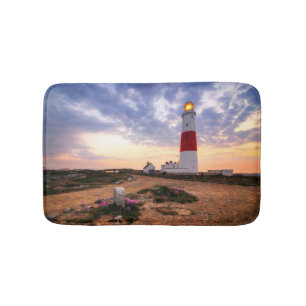 Goldener Sonnenaufgang an Leuchtturm Portlands Badematte