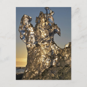 Goldener Sonnenaufgang durch Eisberge Postkarte